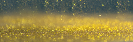 Golden and blue christmas background with bokeh lightsの写真素材