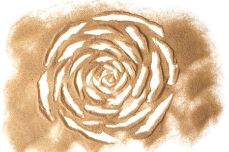 Sand sculputered rose isolated in whiteの写真素材