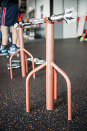 Two barbell stands with rod in short dept of fieldの写真素材