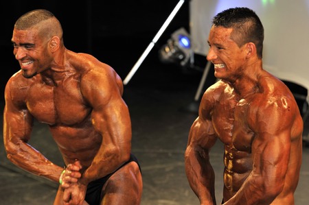 ROOSENDAAL, THE NETHERLANDS - OCTOBER 19, 2014. Male bodybuilders showing their best at the bodybuilding and fitness contest at the Walter's Open Dutch Championship Bodybuilding and Fitness on oktober 19, 2014 in Theatre "De Kring" at Roosendahl,のeditorial素材