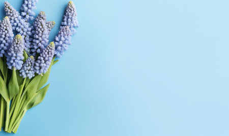 Vibrant bunch of purple hyacinths against a vivid blue backdrop, symbolizing spring's bloom. A captivating flower arrangement. AI Generativeの素材