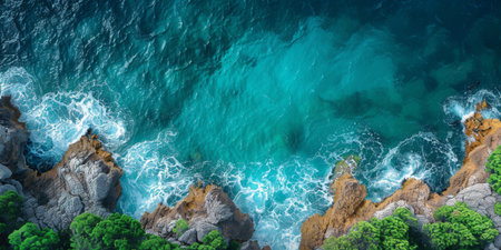Aerial View of Body of Water Surrounded by Rocks.の素材