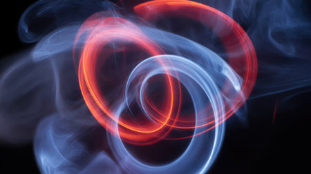 Abstract swirling red and blue light trails intertwining against a dark background with ethereal smoke like effects.の素材