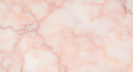 Soft pink marble texture with subtle white and peach veins creating an elegant and smooth natural stone surface.の素材