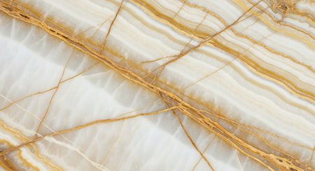 Elegant white marble surface with golden veins creating a luxurious natural stone pattern.の素材