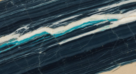 Black marble surface with blue and white streaks creating elegant natural stone pattern.の素材