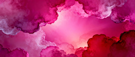 Vibrant pink and magenta clouds illuminated by sunlight in a dramatic sky creating a dreamy atmospheric abstract background.の素材