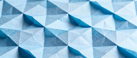 Geometric blue origami inspired surface with repeating triangular faceted pattern and textured paper details in close up view.の素材