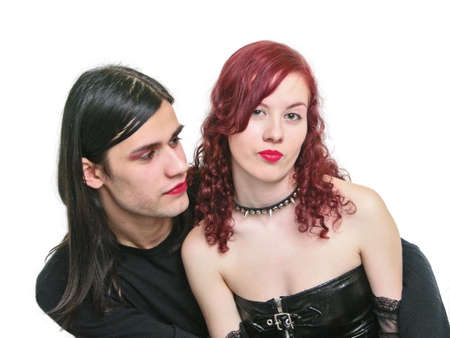 two gothes: red haired girl and beautiful guyの写真素材