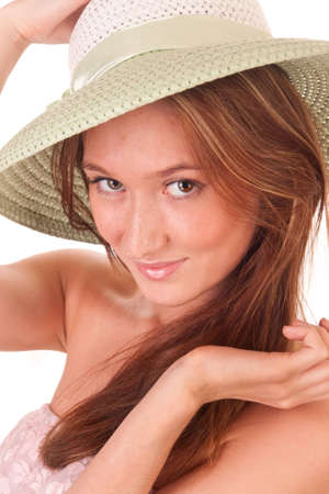 the pretty girl in green hat isolated on whiteの写真素材
