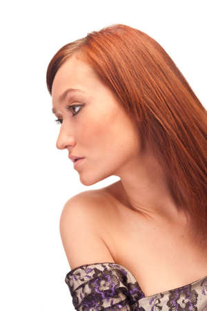 isolated profile of attractive red-haired girl with long eyelashesの写真素材