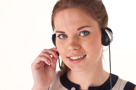 pretty girl with headset isolated on whiteの写真素材