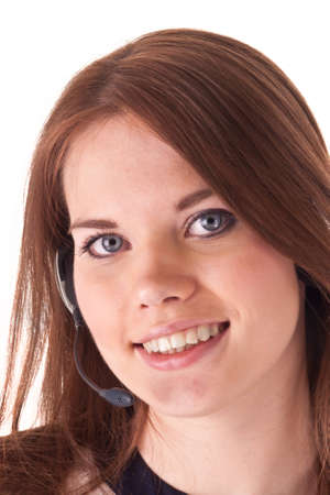 the attractive girl with headset isolated on whiteの写真素材