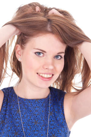 Young beautiful female posing in front of camera isolated on whiteの写真素材