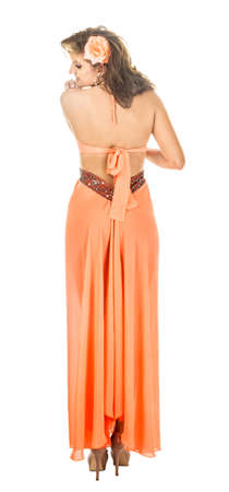 fashion female dressed in orange back viewの写真素材
