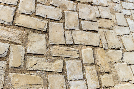 Brick stone street road background. Grey pavement textureの写真素材