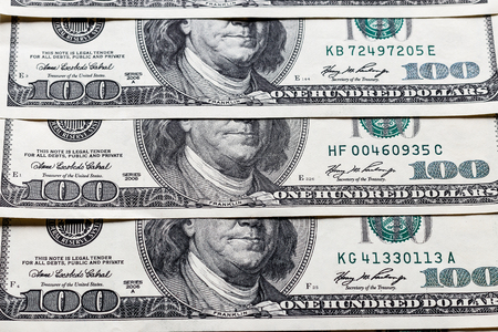 Background with money american dollar bills. Cash dollars.