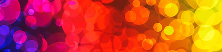 Lights holiday bokeh. Abstract round Christmas background for design. Blur.Rainbow   gradient.の写真素材