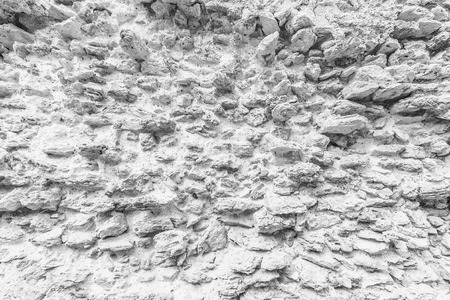 Background of ancient  stone wall. Texture of old brick. Roman architecture.の写真素材