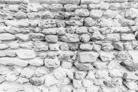 Background of ancient  stone wall. Texture of old brick. Roman architecture.の写真素材