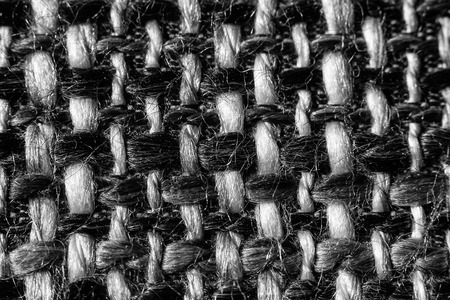 Texture of cloth material for design. Abstract background with white, black and gray threads of woven.の写真素材