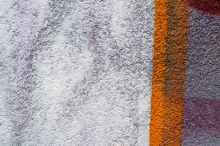 Fragment of colored graffiti painted on a concrete wall. Texture. Abstract background for design.の写真素材