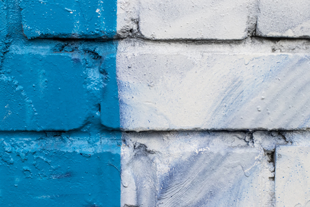 Fragment of colored graffiti painted on a brick wall. Texture. Abstract background for design.の写真素材