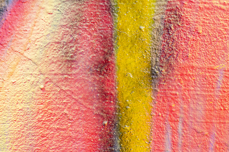 Fragment of colored graffiti painted on a concrete wall. Texture. Abstract background for design.の写真素材