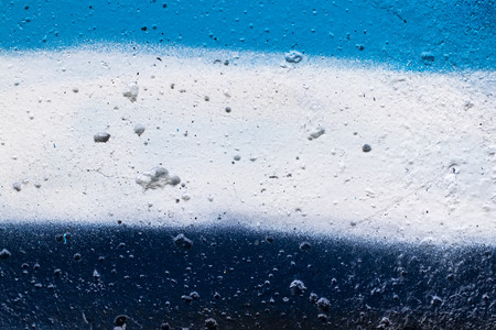 Fragment of colored graffiti painted on a concrete wall. Texture. Abstract background for design.の写真素材