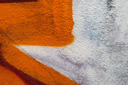 Fragment of colored graffiti painted on a concrete wall. Texture. Abstract background for design.の写真素材