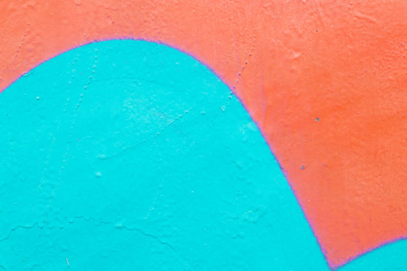 Fragment of colored graffiti painted on a brick wall. Texture. Abstract background for design.の写真素材