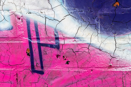 Fragment of colored graffiti painted on a brick wall. Texture. Abstract background for design.の写真素材