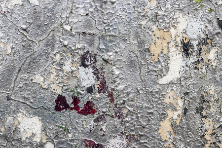 Fragment of colored graffiti painted on a concrete wall. Texture. Abstract background for design. Peeling color paint.の写真素材