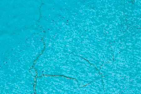 Fragment of colored graffiti painted on a concrete wall. Texture. Abstract background for design. Peeling color paint.の写真素材