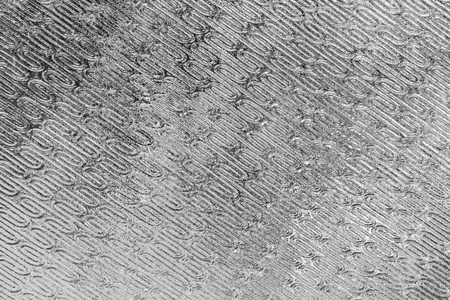 Texture of glass with a pattern. Abstract background for design.の写真素材