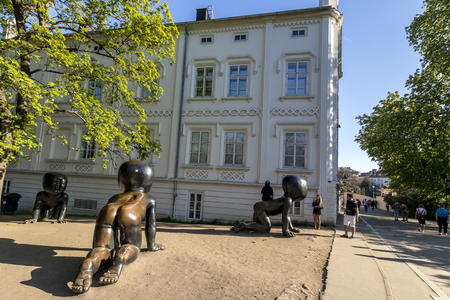 PRAGUE, CZECH REPUBLIC - APRIL 21: Three big bronze baby sculptures by David Cerny. Park on the Kampa Island.のeditorial素材
