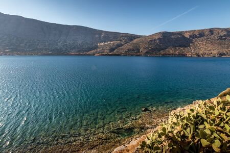 Spinalonga fortress on a clear sunny day. The ruins of leprosolium. Venetian bastion.の写真素材