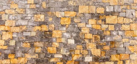 Background of ancient stone wall. Texture of old brick.