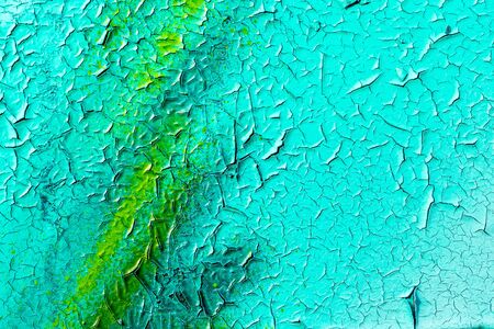 Fragment of colored graffiti painted on a stone wall. Abstract background for design. Old peeling paint.の写真素材