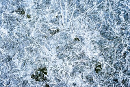 Texture of ice in the winter. Abstract background of frost for design, photographed closeup. A...