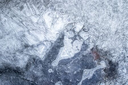 Texture of ice in the winter. Abstract background of frost for design, photographed closeup. A...