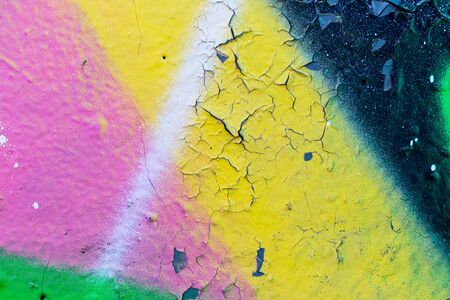 Fragment of colored graffiti painted on a wall. Bright abstract backdrop for design.の写真素材
