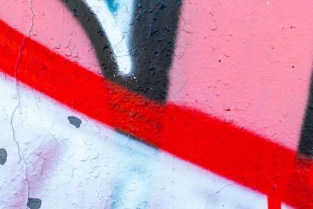 Colored graffiti painted on a wall. Bright abstract background for design.の写真素材