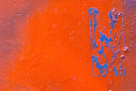 Fragment of colored graffiti painted on a wall. Bright abstract background for design.