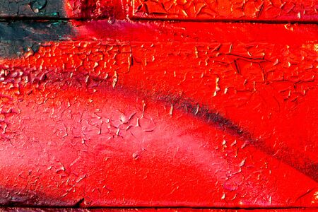 Fragment of colored graffiti painted on a wall. Bright abstract background for design.