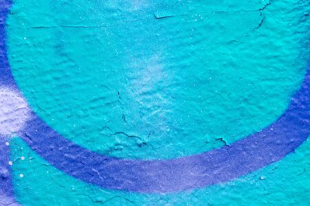 Colored graffiti painted on a wall. Bright abstract background for design.の写真素材