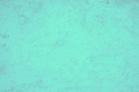 Texture of turquoise decorative plaster or concrete. Abstract backdrop for design. Art stylized...