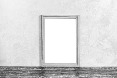 Black wooden floor over concrete or decorative plaster wall and photo frame with copy space for a text background. Mock up for design. Monochrome.の写真素材