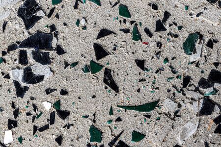 Concrete wall with glass inserts texture. Abstract background for design.の写真素材
