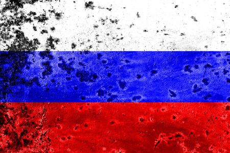 Russian flag on rusty metal texture. The concept of crisis, default, economic collapse, pandemic, conflict, terrorism or other problems in the country. Abstract disaster symbol.の写真素材
